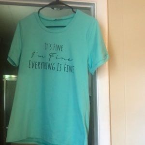 Great condition. Light green t-shirt